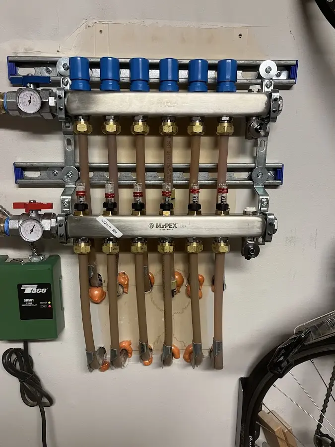 Plumber performing Leak Detection at a residential property in Henrietta